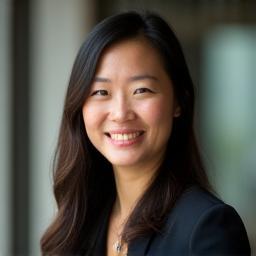 Sarah Chen, Centre Director at Wattlewood ELC, smiling warmly